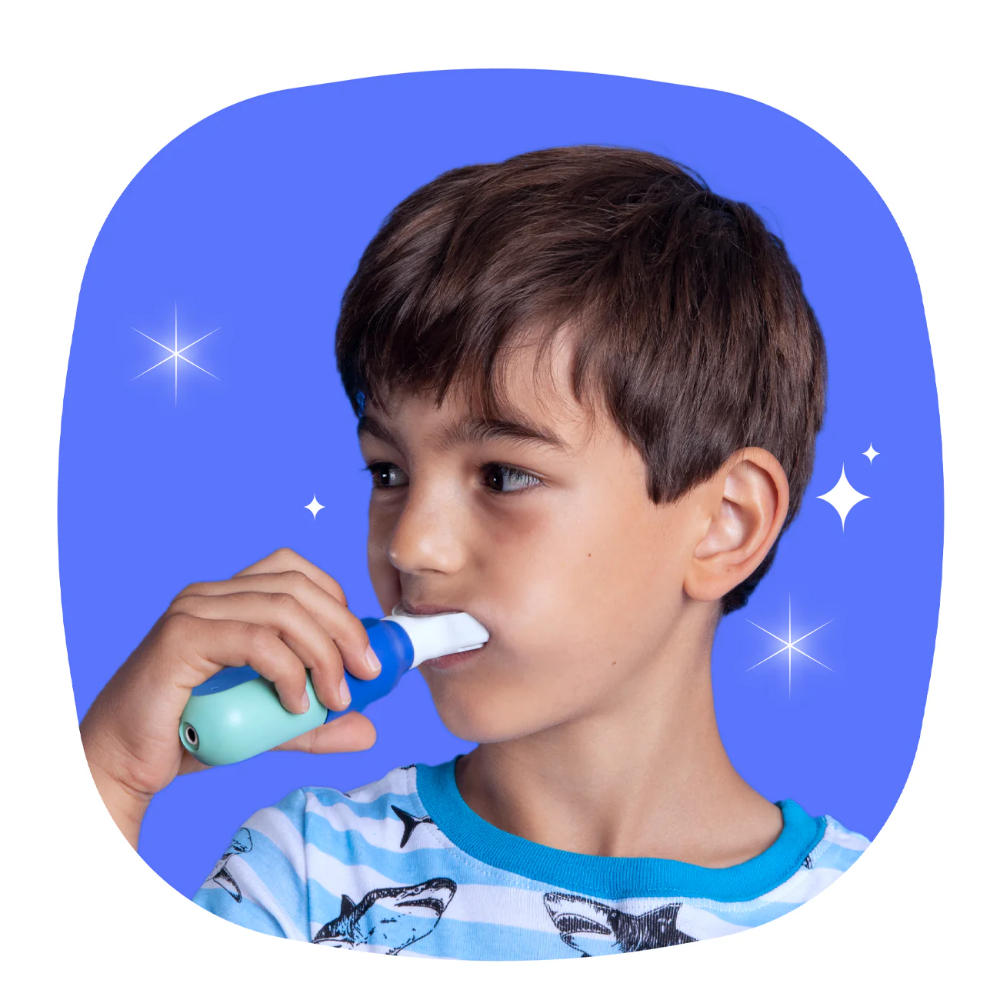 boy holding symplbrush